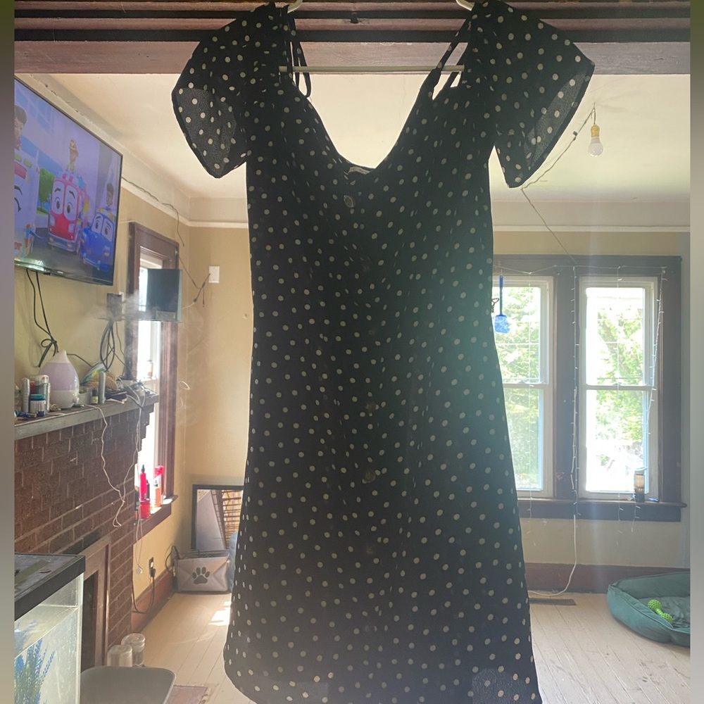 Black polka dot shirt